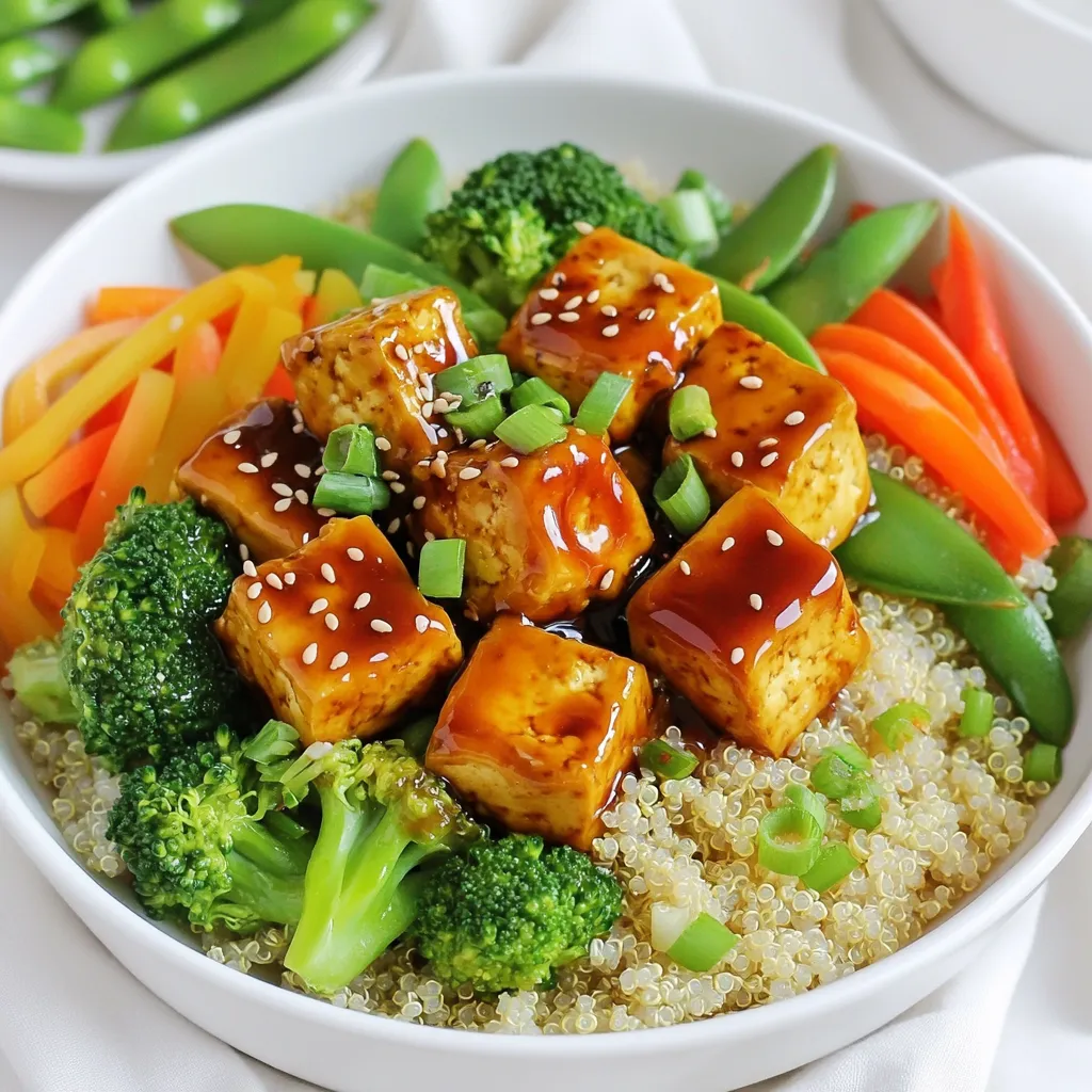 - 1 block (14 oz) firm tofu, pressed and cubed - 1 cup cooked quinoa - 1 cup broccoli florets - 1 red bell pepper, sliced - 1 carrot, julienned - 1 cup snap peas In this dish, firm tofu is your star. It holds its shape well and absorbs flavors. Cooking it until golden gives it a nice crunch. Quinoa adds protein and a nutty flavor. The mix of broccoli, red bell pepper, carrot, and snap peas adds color and nutrients. Each vegetable brings its own taste and texture, making every bite exciting. - 1/4 cup low-sodium soy sauce - 2 tablespoons maple syrup - 1 tablespoon rice vinegar - 1 tablespoon freshly grated ginger - 2 cloves garlic, minced The teriyaki sauce is simple yet full of flavor. Low-sodium soy sauce gives it a savory base. Maple syrup adds sweetness without being too strong. Rice vinegar adds a tangy note that balances the sauce. Fresh ginger and garlic give it a warm, aromatic touch. Mix these ingredients well to get a smooth sauce. - 2 green onions, chopped - Sesame seeds for garnish Green onions add a fresh crunch. They brighten the dish with color and taste. Sesame seeds add a nutty flavor and extra crunch when sprinkled on top. Together, these garnishes elevate your power bowls, making them look and taste great. First, you need to press the tofu. This step removes excess water. Wrap the tofu in a clean towel. Place a heavy object on top. Let it sit for 15-20 minutes. After pressing, cut the tofu into small cubes. Aim for about one-inch pieces. Next, cook the tofu until it is crispy. Heat one tablespoon of sesame oil in a non-stick skillet over medium heat. Add the tofu cubes to the skillet. Cook them for 8-10 minutes. Turn them often for an even golden color. Once crispy, pour the teriyaki sauce over the tofu. Let it cook for an extra 2-3 minutes. This will give the tofu a nice glaze. To make the teriyaki sauce, combine the ingredients in a bowl. You will need low-sodium soy sauce, maple syrup, rice vinegar, grated ginger, and minced garlic. Stir everything well. Set the sauce aside until you are ready to use it. Now, heat the remaining tablespoon of sesame oil in another pan. Add the broccoli, red bell pepper, carrot, and snap peas. Sauté the vegetables for about 5-7 minutes. You want them tender but still bright and crisp. This keeps the veggies flavorful and colorful. To assemble your power bowls, start with a base of cooked quinoa. Spoon in about a cup of quinoa in each bowl. Next, layer on the crispy teriyaki tofu. Add a generous amount of sautéed vegetables on top. The layers create a beautiful and tasty meal. Finally, garnish your bowls. Sprinkle chopped green onions over the top. Add a few sesame seeds for extra crunch. Serve your teriyaki tofu power bowls right away. Enjoy the bright colors and rich flavors! Pressing tofu is key. It removes extra water, allowing the tofu to absorb flavors better. To do this, wrap the tofu in a clean towel. Place a heavy object on top for about 15-20 minutes. This step helps achieve a firmer texture. To get perfectly crispy tofu, heat a non-stick skillet over medium heat. Use sesame oil, as it adds flavor. Cook the tofu cubes for 8-10 minutes. Turn them often until they are golden brown on all sides. Pour teriyaki sauce over the tofu at the end. This gives a nice glaze and enhances the taste. Each vegetable has an ideal cooking time. Broccoli florets need about 5-7 minutes to stay bright and crisp. Red bell peppers also take around 5-7 minutes. Carrots should be julienned thinly for quick cooking. Snap peas only need about 3-4 minutes to keep their snap. If you can’t find a vegetable, use seasonal ones. For example, zucchini or asparagus work well in this dish. They add color and flavor while keeping the meal fresh. To boost the flavor of your Teriyaki Tofu Power Bowls, consider adding extra seasonings. A sprinkle of red pepper flakes can add heat. You can also mix in sesame seeds for a nutty taste. Customizing the teriyaki sauce is simple. Try adding a splash of orange juice or a spoonful of peanut butter. These additions can create new flavor profiles. Experiment until you find your perfect blend! {{image_2}} You can switch the tofu for tempeh or chicken. Tempeh gives a nutty taste. Chicken adds a different texture. Both options work well. You can also add legumes, like chickpeas or black beans. They boost protein and fiber. This makes your meal more filling and nutritious. To make this dish gluten-free, use tamari instead of soy sauce. Tamari is a great gluten-free option. You can also use coconut aminos for a sweeter flavor. For a fully vegan dish, make sure your maple syrup is pure. This ensures you keep it plant-based and tasty. While quinoa is a great base, you can use brown rice or farro. Brown rice adds a chewy texture, while farro has a nutty taste. Mixing different grains can create a fun texture. You can try half quinoa and half brown rice. This adds variety and makes it exciting to eat! To keep your Teriyaki Tofu Power Bowls fresh, store leftovers in an airtight container. Place the tofu, quinoa, and veggies separately. This helps maintain the texture. You can enjoy them for up to four days in the fridge. If you want to save some for later, freeze individual portions. Use freezer-safe containers or bags to store the tofu and veggies. They can last up to three months in the freezer. When ready to eat, thaw them overnight in the fridge. Reheat in a skillet or microwave until warm. To make meal prep easy, wash and chop your veggies ahead of time. Cook the quinoa and tofu in advance, too. Store each ingredient in separate containers. This way, you can quickly assemble your bowls during the week. Just mix and match for a fresh meal every day. To make Teriyaki sauce, you need a few simple items. Start with: - 1/4 cup low-sodium soy sauce - 2 tablespoons maple syrup - 1 tablespoon rice vinegar - 1 tablespoon freshly grated ginger - 2 cloves garlic, minced Mix these ingredients in a small bowl. Stir well until combined. This sauce adds a nice sweet and savory flavor to your dish. Yes, you can use frozen vegetables. They are a great time saver. When cooking frozen veggies, add them directly to the pan. Sauté them for about 5-7 minutes. This keeps them crisp and tasty. Just make sure to adjust the cooking time, as frozen veggies may release more water. Teriyaki Tofu Power Bowls pair well with many sides. Here are some ideas: - Steamed brown rice - A fresh green salad - Edamame for extra protein - Pickled ginger for a tangy kick These sides can enhance your meal and add more flavors. Yes, it's very healthy! This dish includes tofu, which is full of protein. The veggies add vitamins and minerals. Quinoa provides fiber and whole grains. Plus, using low-sodium soy sauce keeps the salt low. Overall, this meal is balanced and nutritious. To add some heat, try these tips: - Sprinkle red pepper flakes on top. - Add a dash of sriracha to the sauce. - Mix in some chili paste during cooking. These options can boost the flavor and give your dish a nice kick. In this article, we explored how to create Teriyaki Tofu Power Bowls. I covered the main ingredients, from firm tofu to vibrant vegetables, and the tasty teriyaki sauce. You learned the step-by-step process for preparing each component, assembling the bowls, and garnishing them for appeal. Remember, you can customize this dish to your taste and dietary needs. Try different proteins or grains; get creative with your veggies. Enjoy making and sharing these delicious bowls!